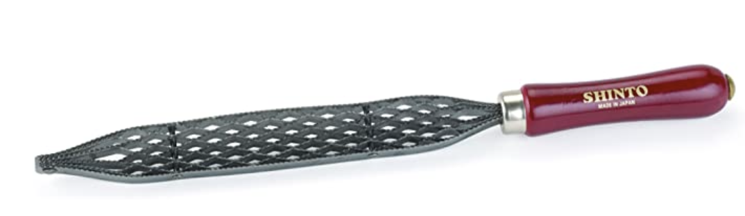 A Shinto saw rasp. (Bob Villa calls this a “surfoam”. This isn't a word I've seen elsewhere.) This removes large amounts of wood. Each of the sides is a different grit. Credit: manufacturer product page.